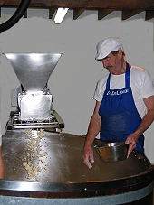Milling the curd and adding salt