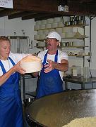 Filling the moulds with curd